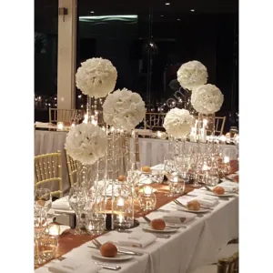 White pomander on cylinder vases